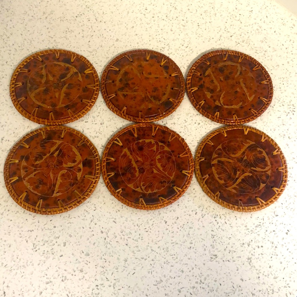 Set of six 4” faux leather coasters. Beautiful floral design.